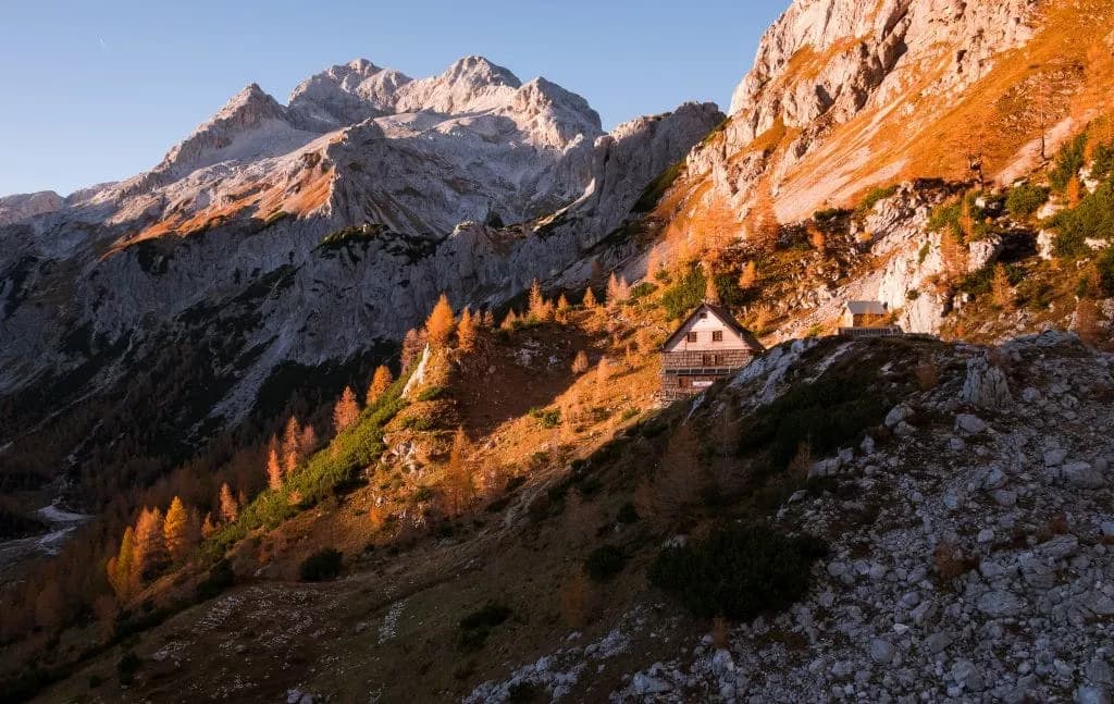 vodnik lodge with triglav in the back 1024x647 1